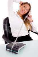 top view of smiling executive talking on phone