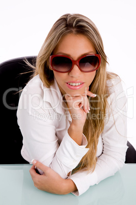 top view of smiling female wearing sunglasses