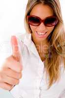 front view of smiling female with thumbs up