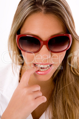 close up of young woman wearing sunglasses