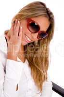 portrait of smiling woman wearing sunglasses