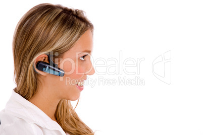 side view of smiling service provider