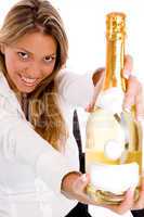 top view of businesswoman showing champagne bottle