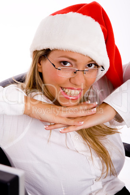 top view of smiling manager wearing christmas hat