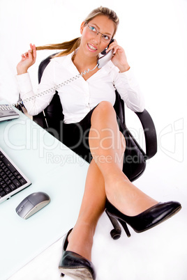 top view of smiling employee talking on phone