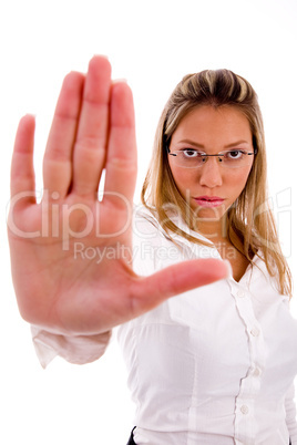 front view of businesswoman showing stopping gesture