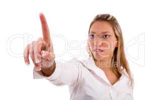 portrait of businesswoman looking her finger