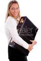 side view of smiling employee holding bag