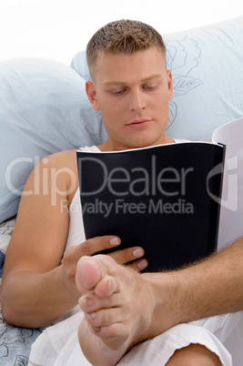 resting male reading report