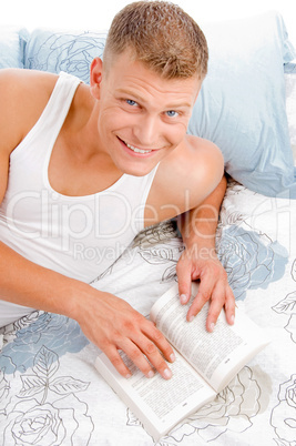 portrait of guy reading a book