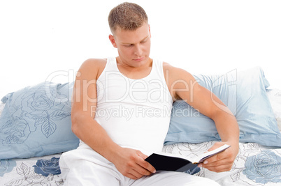 handsome male reading book