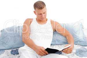 handsome male reading book
