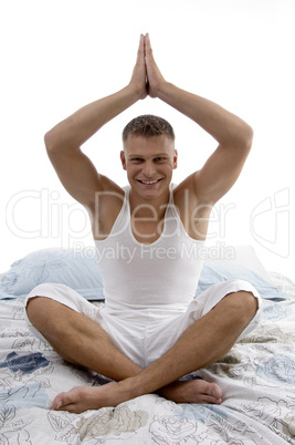 handsome man practicing yoga