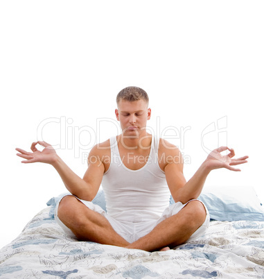 young man in yoga lotus pose