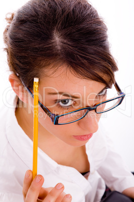 high angle view of thinking female student