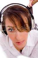 front view of female listening music in headset