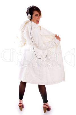 full body pose of shouting woman in overcoat