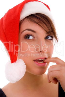 front view of thinking woman in christmas hat