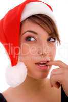 front view of thinking woman in christmas hat