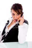 front view of angry female corporate woman talking on phone