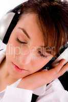 closeup of businesswoman tuned to music