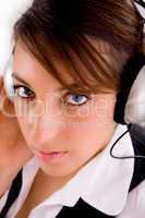 closeup of female entrepreneur listening music in headset