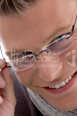 portrait of smiling young male wearing eyewear