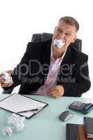 frustrated businessman with papers