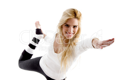 side view of smiling woman doing stretching exercise