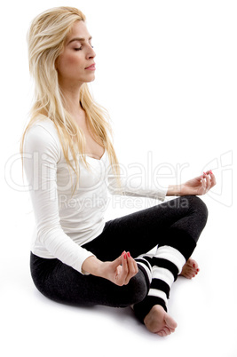 front view of woman practicing yoga