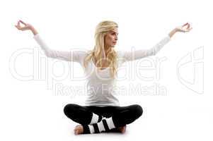 front view of woman practicing yoga