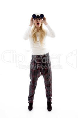 front view of woman looking through binoculars