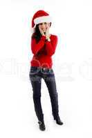 standing young woman posing with christmas hat