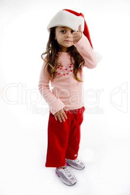 christmas hat  wearing girl showing thumbs up