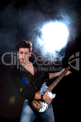 Cool man with electric guitar