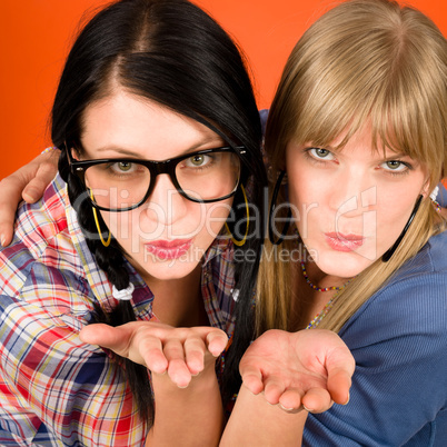 Two woman friends young send kiss