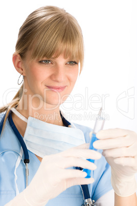 Young medical nurse doctor female hold injection