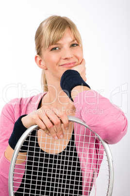 Tennis player woman young smiling leaning racket
