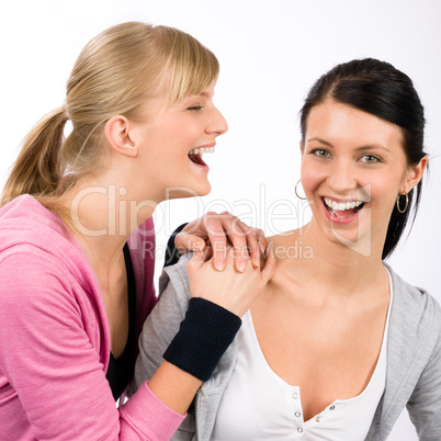 Two sport woman friends smiling