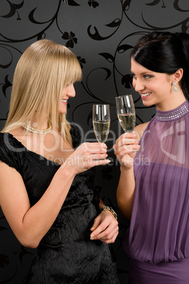Woman friends party dress toast champagne glass