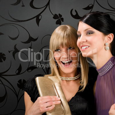 Woman friends party dress smiling spying someone
