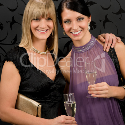 Woman friends party dress hold champagne glass