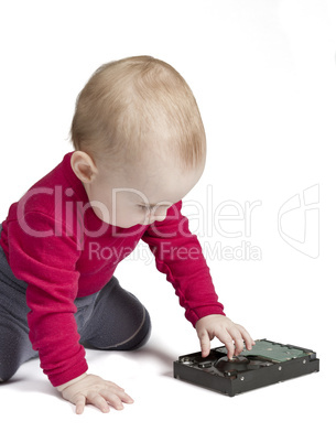 young child in white background with hard drive