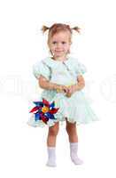 Young girl happy with wind toy on the white background