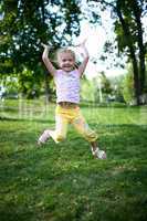 little girl jumping