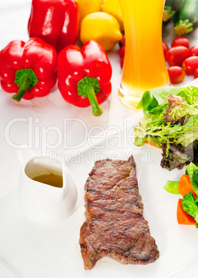 juicy BBQ grilled rib eye ,ribeye steak and vegetables