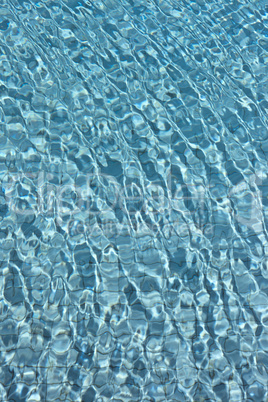 beautiful clear pool water reflecting in the sun