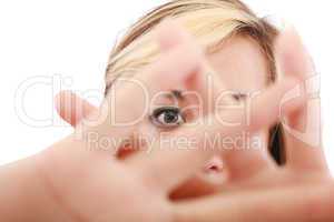 blonde female hide her face behind her hand, keep away gesture,