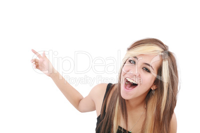 Closeup of cheerful young woman pointing at something interestin