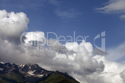 Mountains and blue sky with clouds